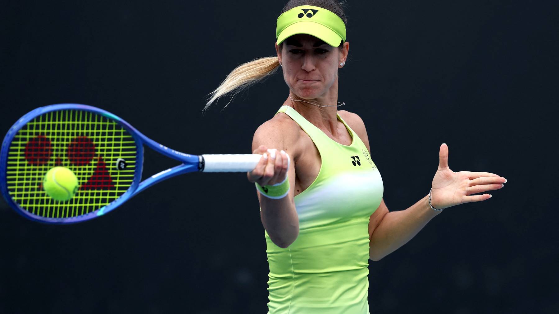 Hungary's Anna Bondar hits a return to Turkey's Zeynep Sonmez during their women's singles match on day four of the Australian Open tennis tournament in Melbourne on January 21, 2026.