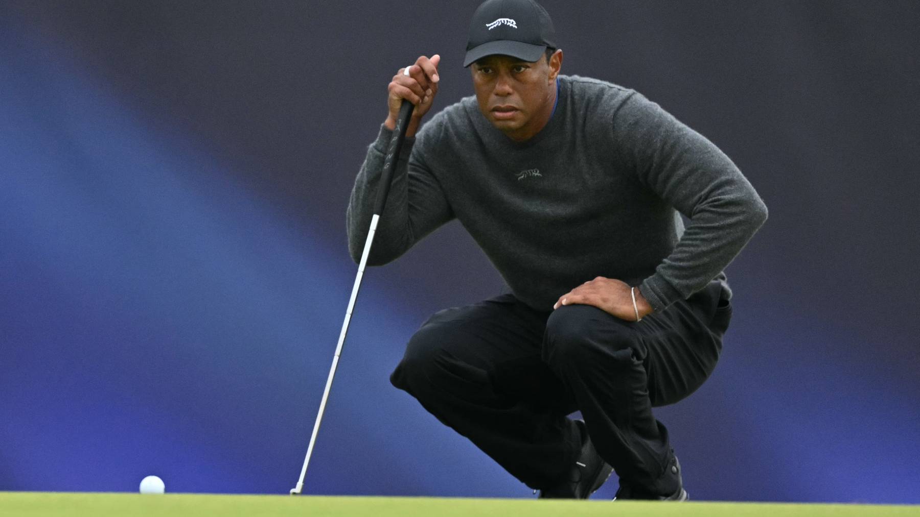 US golfer Tiger Woods lines up a putt on the 17th green on the opening day of the 152nd British Open Golf Championship at Royal Troon on the south west coast of Scotland on July 18, 2024. Golf superstar Tiger Woods was involved in a car crash in Florida on March 27, 2026, US media reports citing local law enforcement said. There was no immediate word on Woods' condition following the incident in Jupiter Island, ABC television reported.