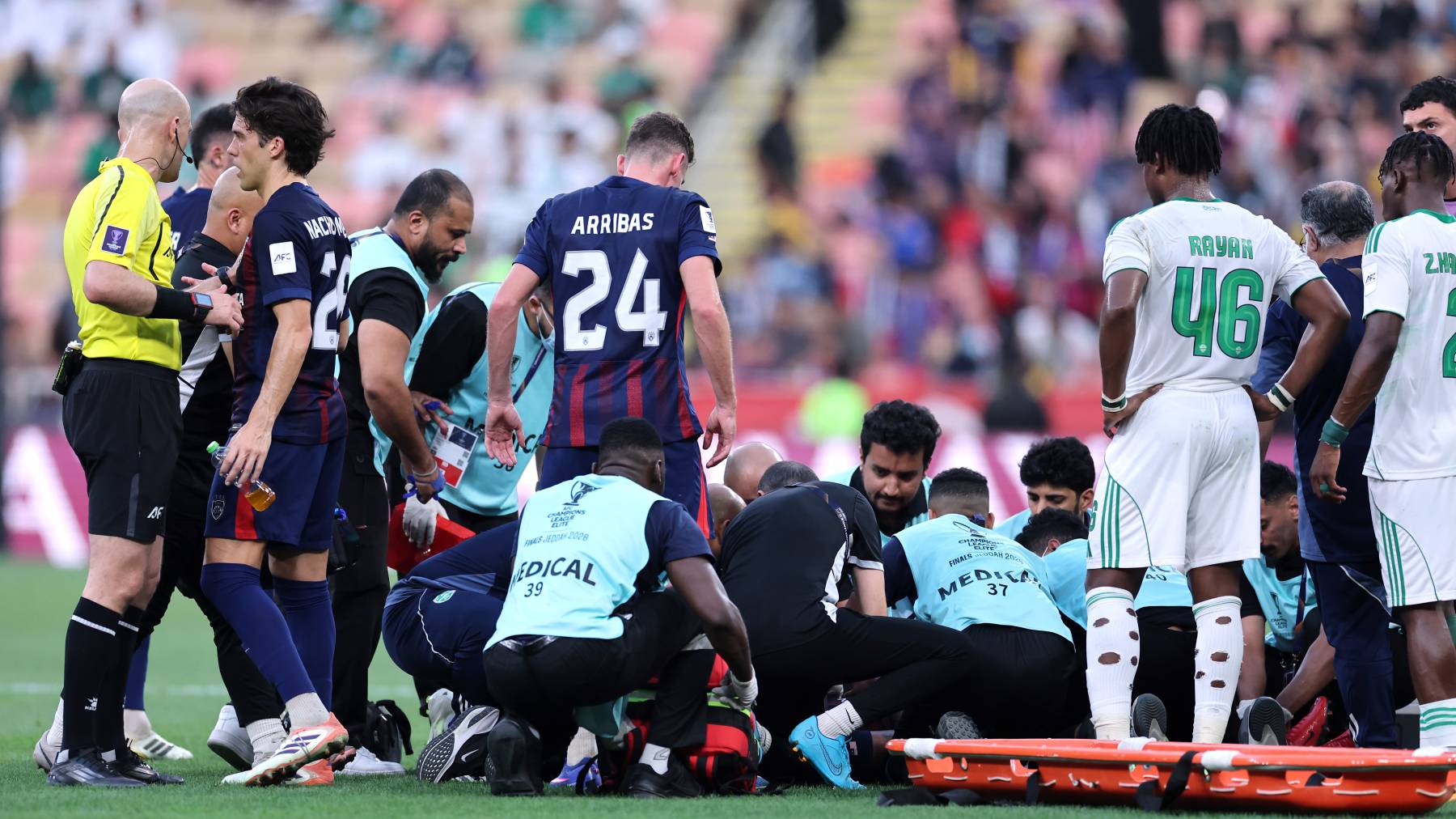 JEDDAH, SAUDI ARABIA - APRIL 17: Jairo of Johor Darul Ta'zim (obscured) receives medical treatment during the AFC Champions League Quarter Final match between Al Ahli and Johor Darul Ta'zim at King Abdullah Sports City on April 17, 2026 in Jeddah, Saudi Arabia. (Photo by Abdullah Ahmed/Getty Images)