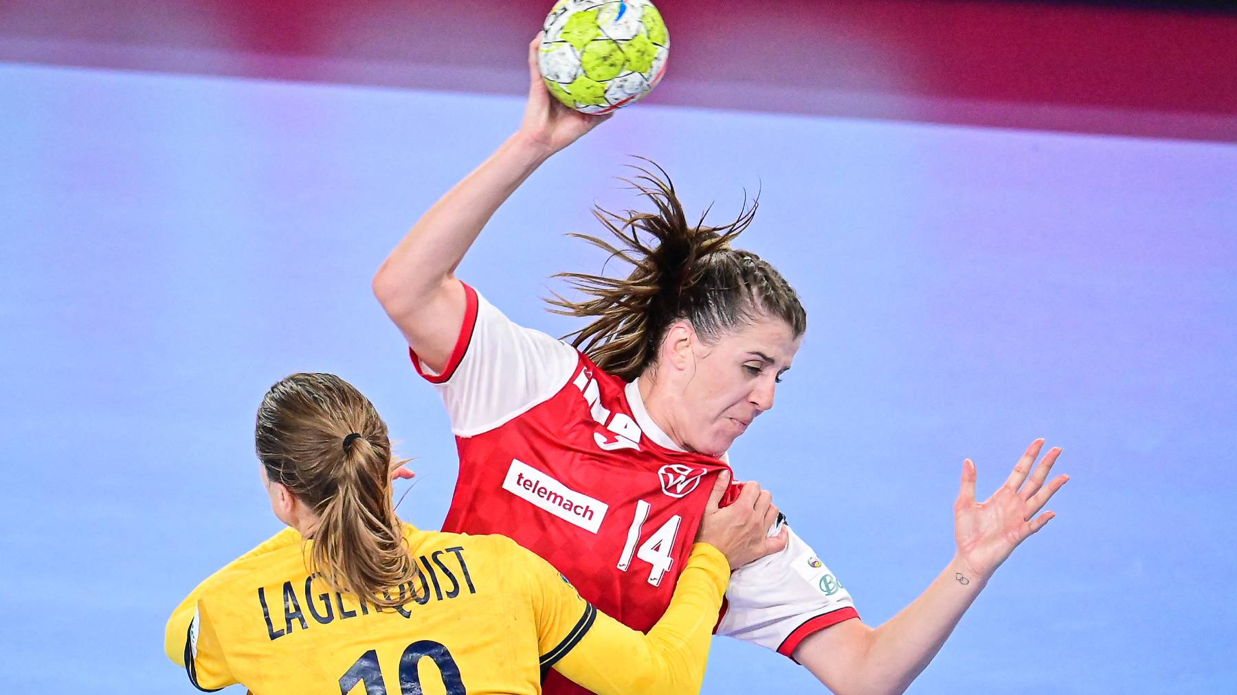Croatia's Larissa Kalaus (R) fights for the ball with Sweden's Anna Lagerquist during the Women's EHF Handball European Championship EURO 2022 main round match between Croatia and Sweden at the Arena Stozice in Ljubljana, on November 16, 2022.