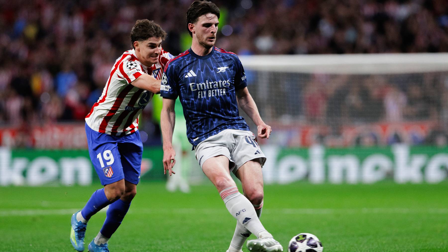 Declan Rice of Arsenal and Julian Alvarez of Atletico de Madrid in action during the UEFA Champions League 2025/26 semifinal first leg match between Atletico de Madrid and Arsenal at Riyadh Air Metropolitano Stadium in Madrid, Spain, on April 29. (Photo by Guillermo Martinez/NurPhoto)