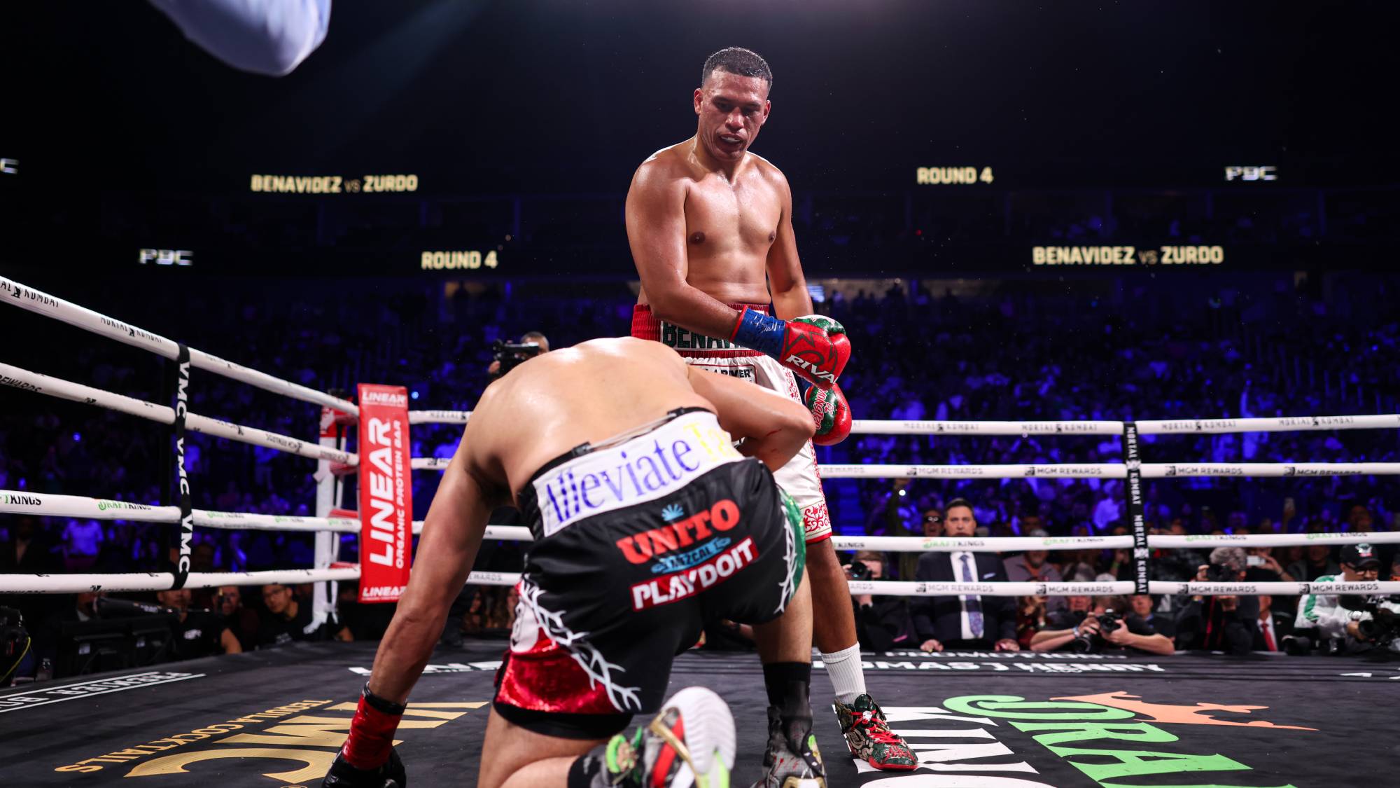 LAS VEGAS, NEVADA - MAY 02: David Benavidez knocks down Gilberto 'Zurdo' Ramirez during their WBA & WBO Cruiserweight World Championship bout at T-Mobile Arena on May 02, 2026 in Las Vegas, Nevada. (Photo by Cris Esqueda/Golden Boy/Getty Images)