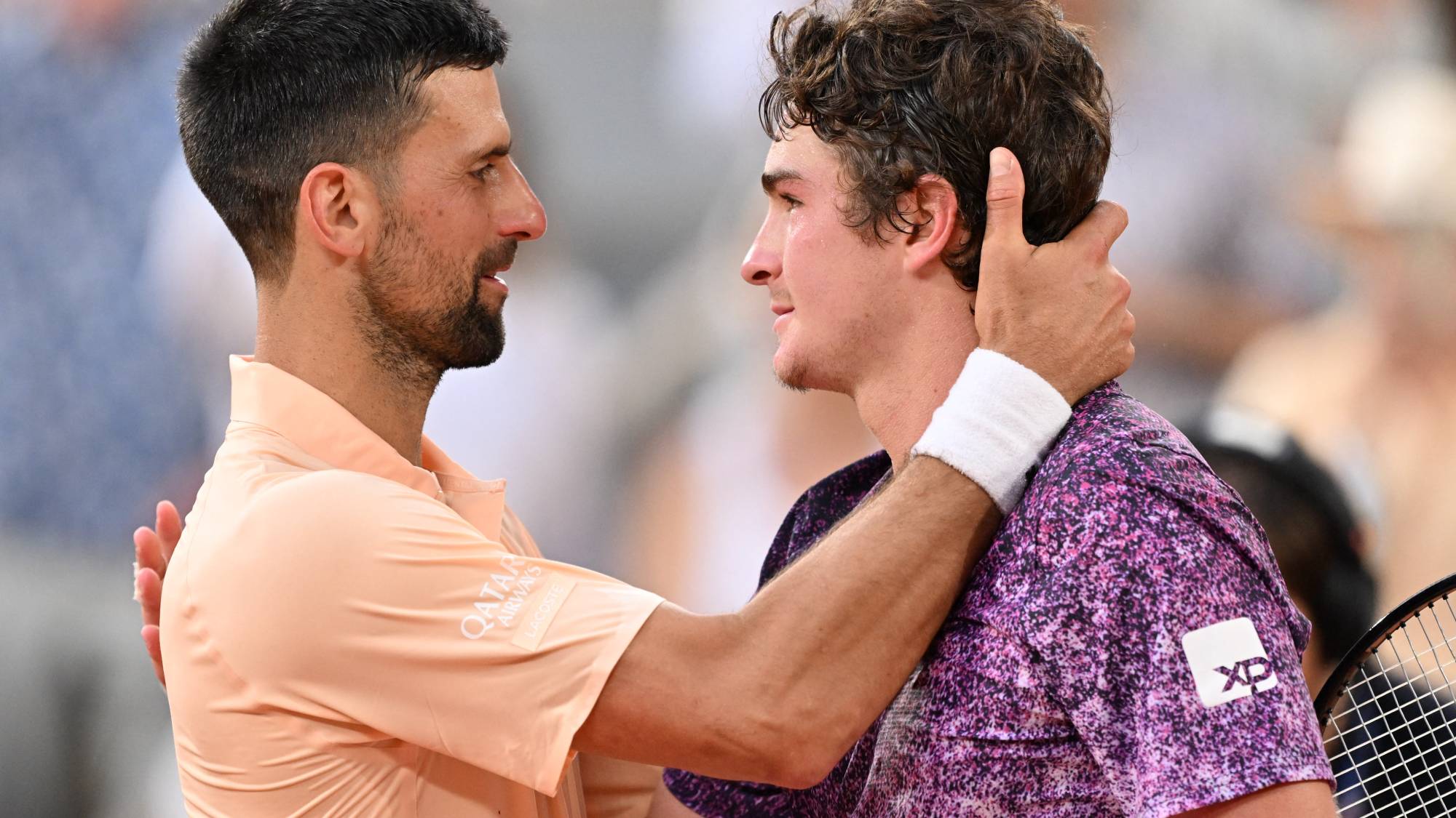 PARIS, FRANCE - MAY 29: Winner Joao Fonseca (R) of Brazil greets his Serbian rival Novak Djokovic (L) at the end of the their Men's Singles third round on Day Six of the 2026 French Open at Roland Garros in Paris, France on May 29, 2026. Mustafa Yalcin / Anadolu