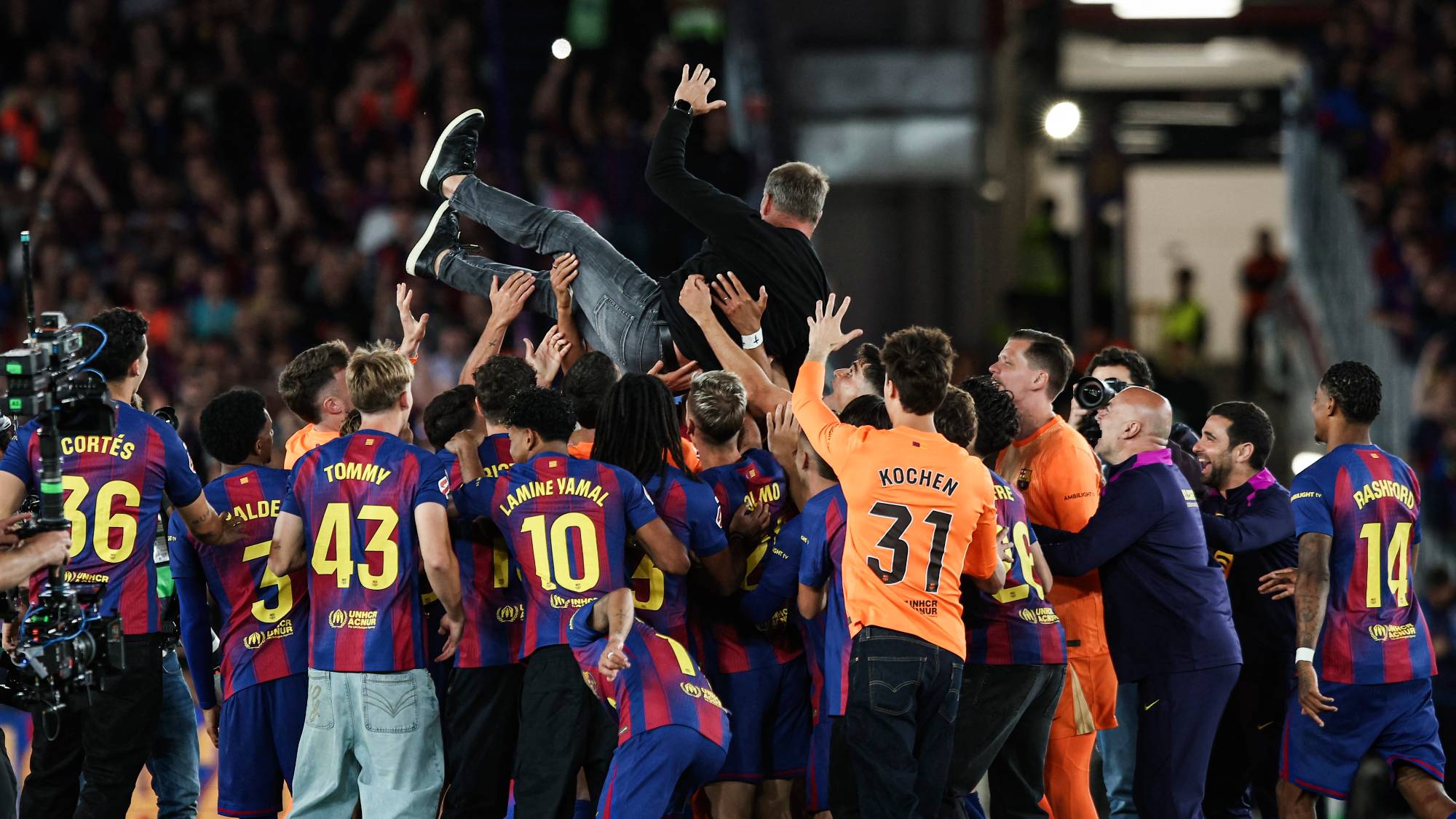FC Barcelona players celebrate the La Liga championship with Hansi Flick, coach of FC Barcelona, during the La Liga EA Sports 2025/26 ''El Clasico'' match between FC Barcelona and Real Madrid at Spotify Camp Nou Stadium in May 2026 in Barcelona, Spain. (Photo by Gongora/NurPhoto)