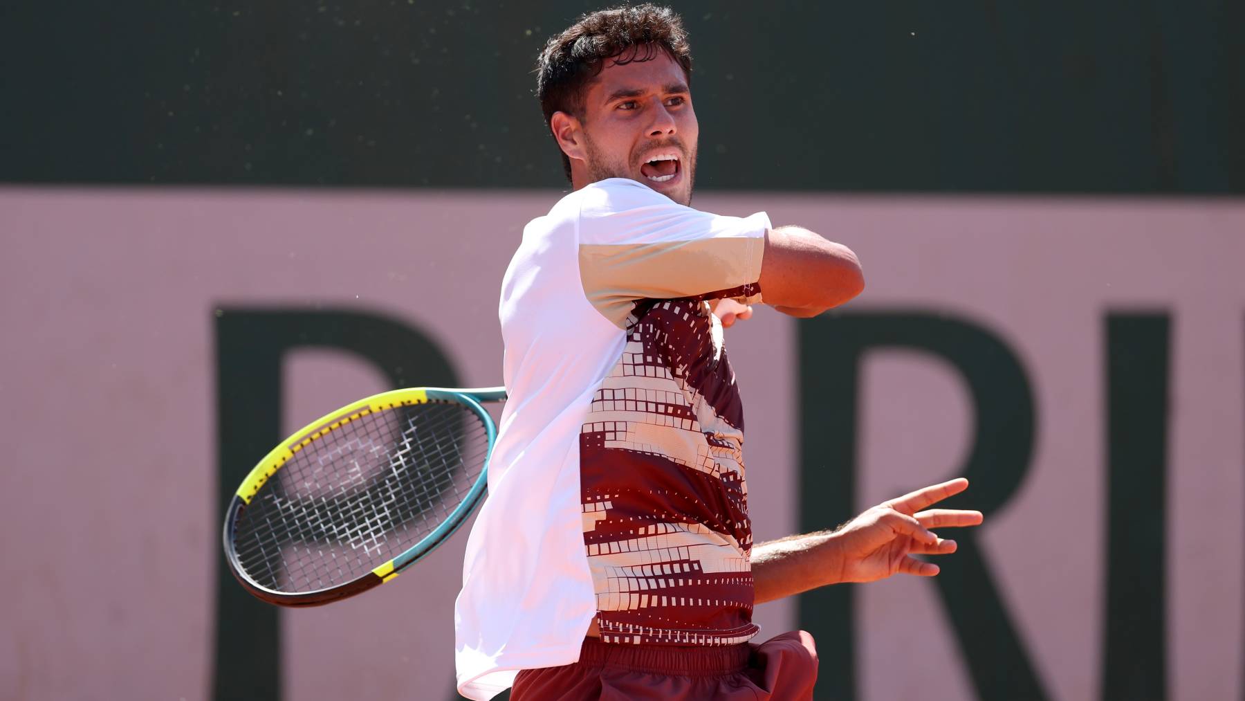 PARIS, FRANCE - MAY 26: Adolfo Daniel Vallejo of Paraguay plays a forehand against Cameron Norrie of the United Kingdom during the Men's Singles first round match during Day Three of the 2026 French Open at Roland Garros on May 26, 2026 in Paris, France. (Photo by Dan Istitene/Getty Images)