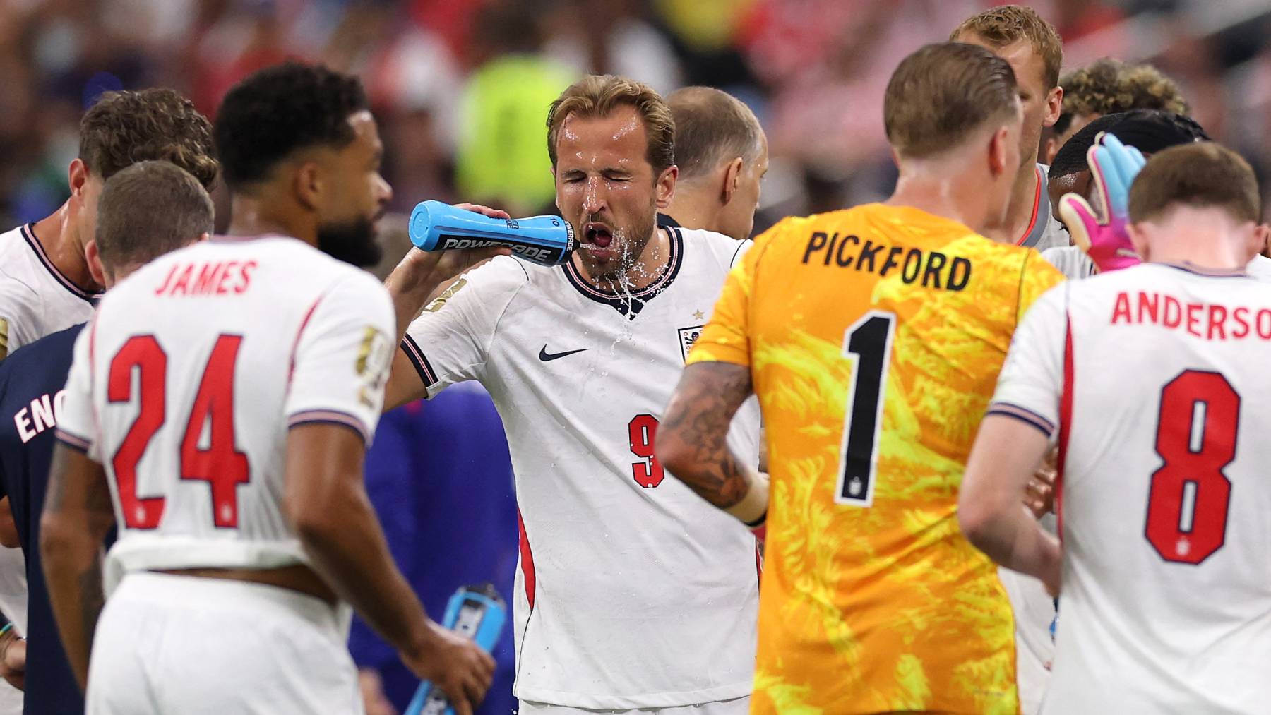ARLINGTON, TEXAS - JUNE 17: Harry Kane #9 of England takes a drink during a hydration break in the FIFA World Cup 2026 Group L match between England and Croatia at Dallas Stadium on June 17, 2026 in Arlington, Texas. Michael Steele/Getty Images/AFP