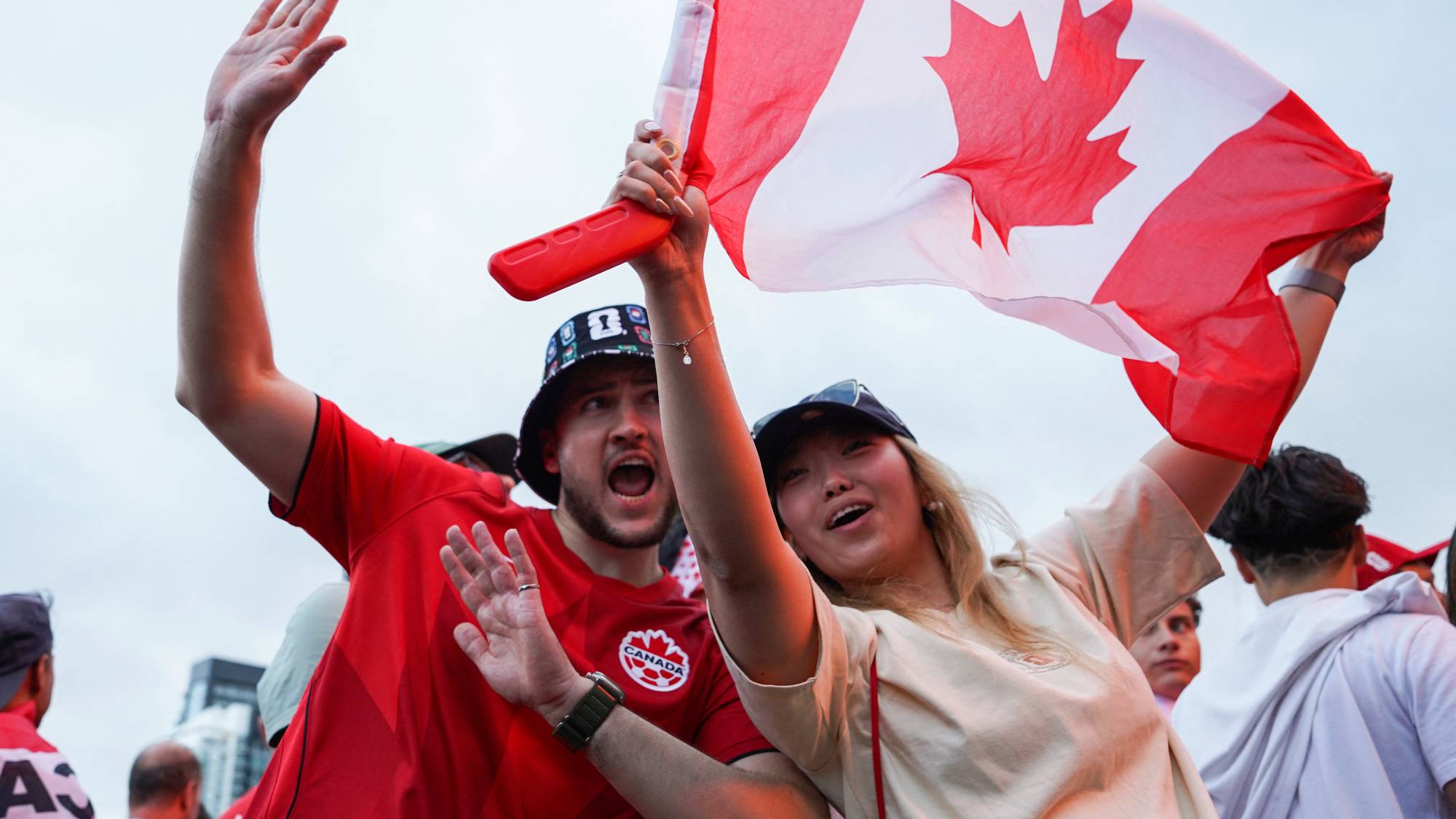 Canadian fans attend the 2026 FIFA World Cup Fan Festival to support their own team for the match between Canada and Qatar at Fort York Blvd. on June 19, 2026 in Toronto, Canada.