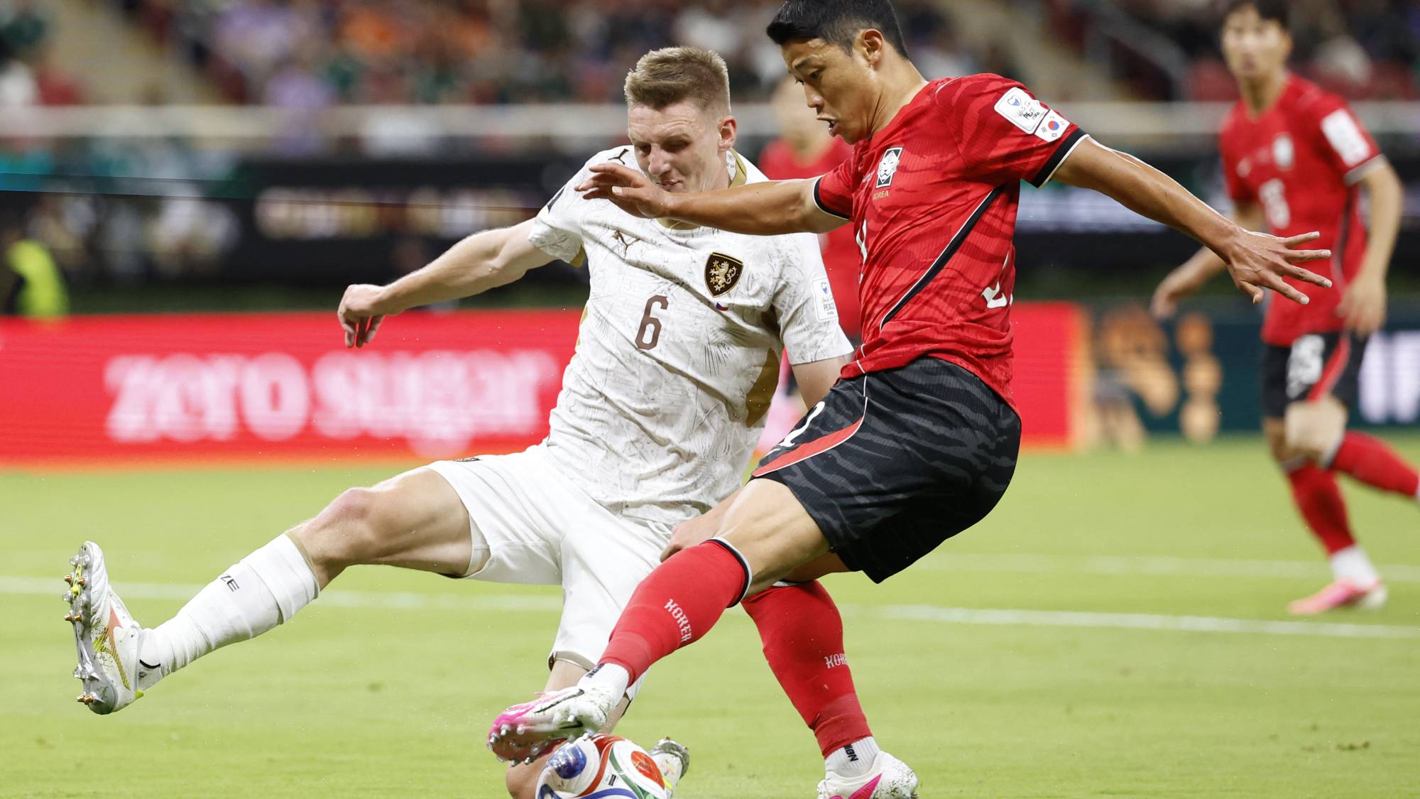 Czech Republic's defender #06 Stepan Chaloupek and South Korea's midfielder #11 Hwang Hee-chan fight for the ball during the 2026 World Cup Group A football match between South Korea and the Czech Republic at the Guadalajara Stadium in Zapopan on June 11, 2026.