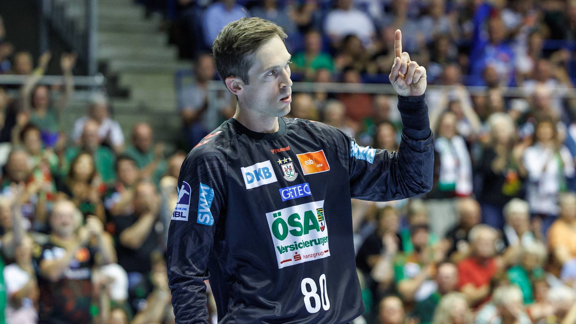 03 June 2026, Saxony-Anhalt, Magdeburg: Handball, Men: Bundesliga, SC Magdeburg - VfL Gummersbach, Matchday 33, GETEC Arena. Nikola Portner (SC Magdeburg) is happy about his save. Photo: Andreas Gora/dpa