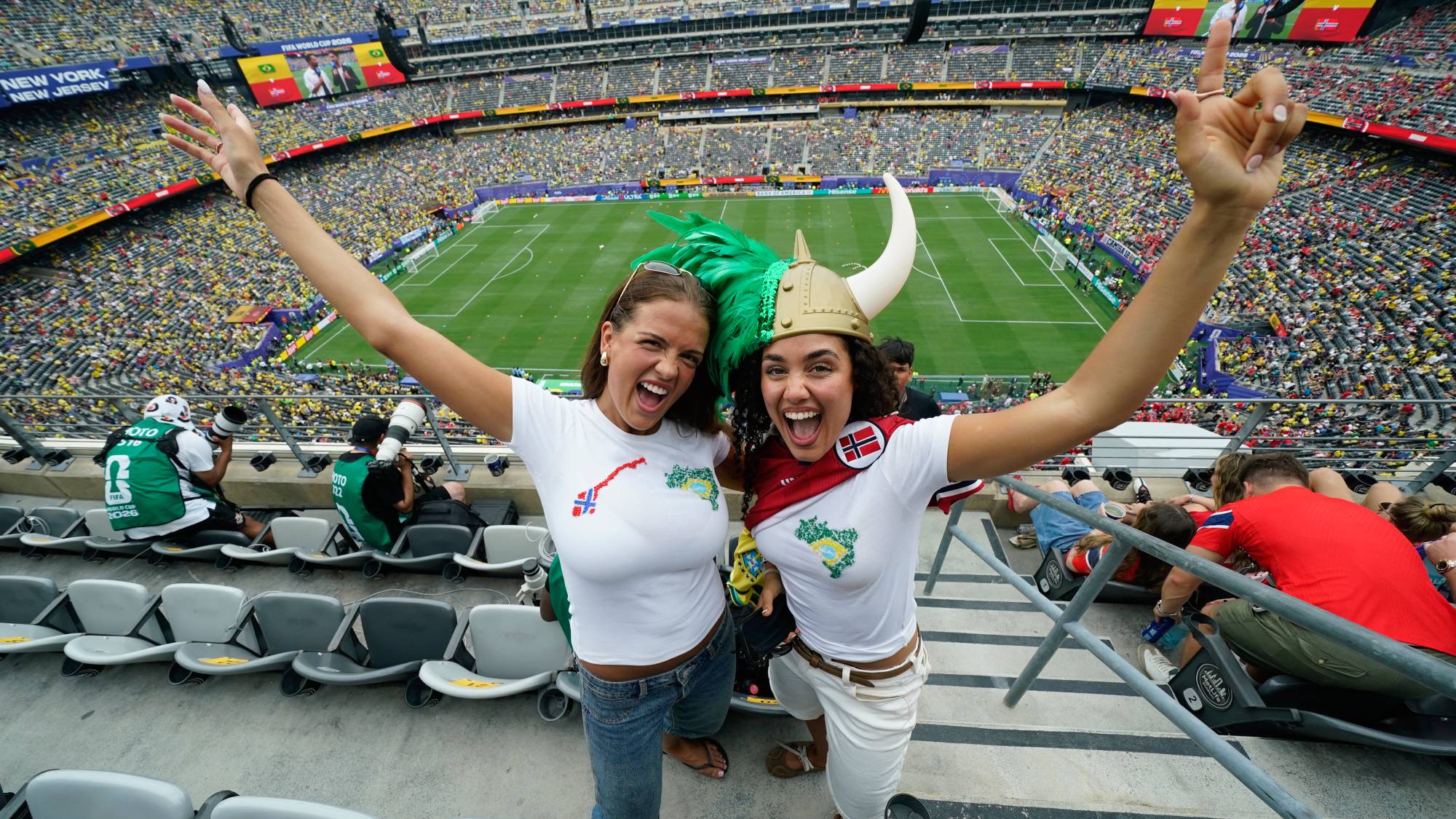 Fans pose for pictures ahead of the 2026 World Cup round of 16 football match between Brazil and Norway at the New York/New Jersey Stadium in East Rutherford on July 5, 2026.