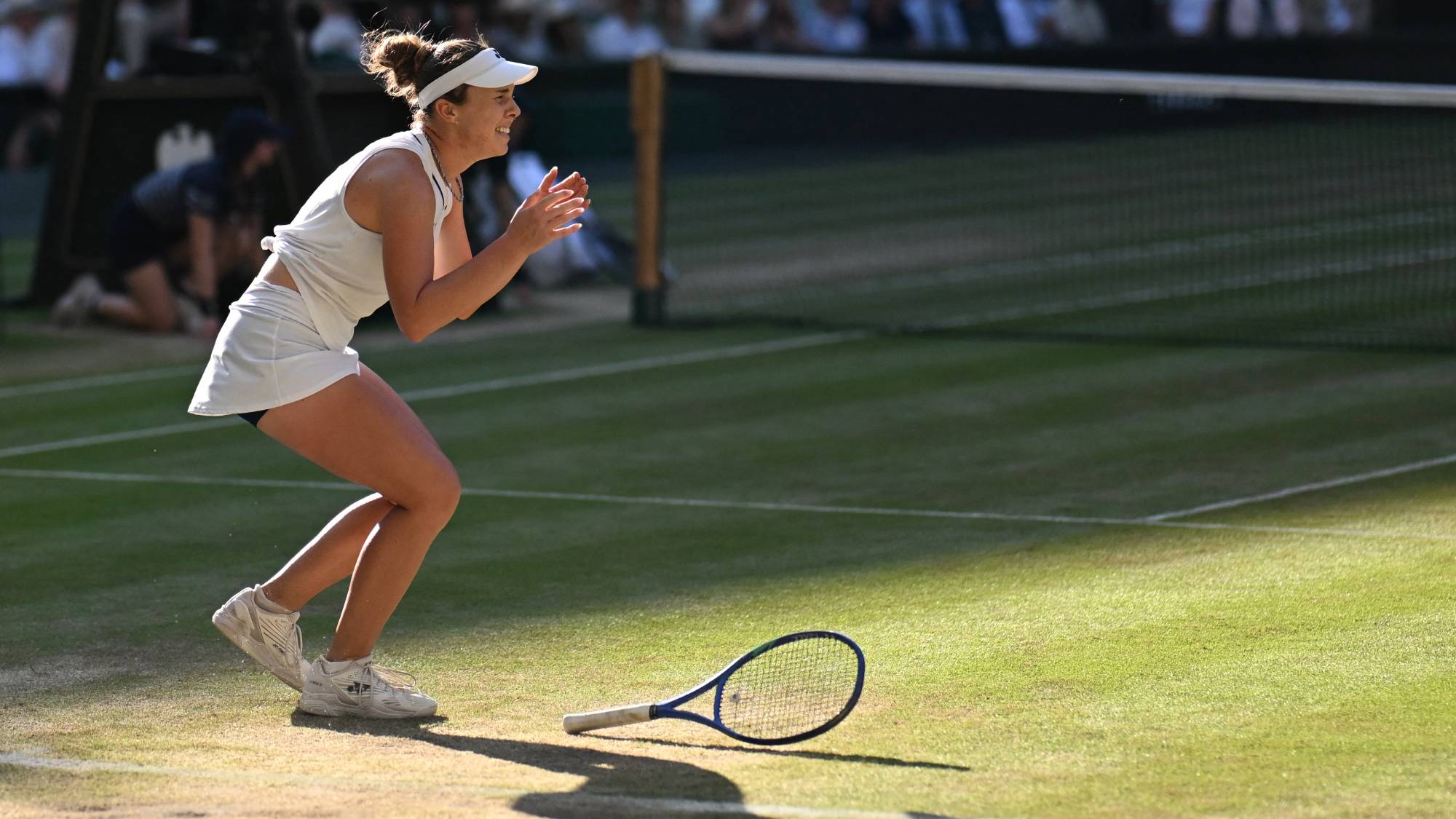 Czech Republic's Linda Noskova celebrates winning against Czech Republic's Karolina Muchova during their women's singles final tennis match on the thirteenth day of the 2026 Wimbledon Championships at The All England Lawn Tennis and Croquet Club in Wimbledon, southwest London, on July 11, 2026.