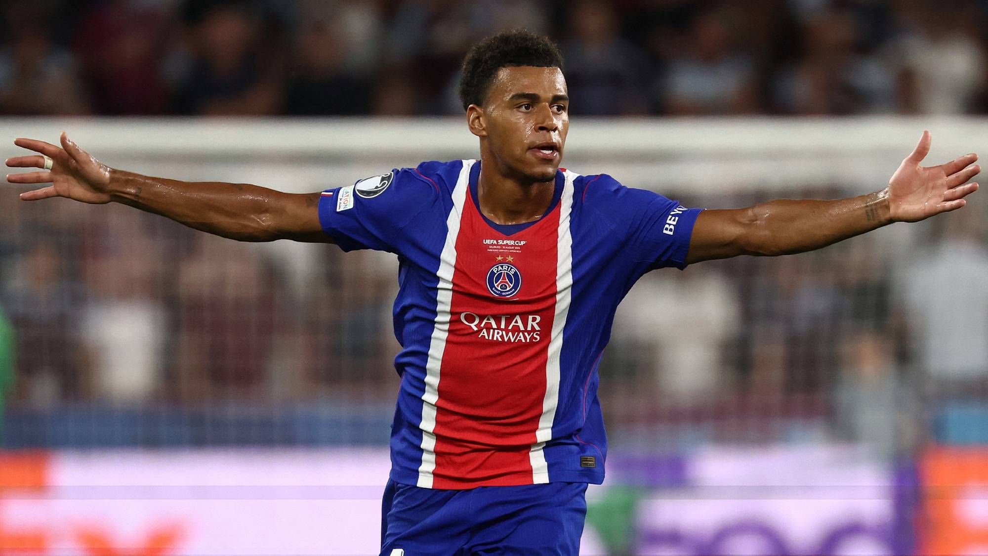 Paris Saint-Germain's French midfielder #14 Desire Doue celebrates scoring the 2-1 goal during the UEFA Supercup football match between Champions League winners Paris Saint Germain (PSG) and Europa League winners Aston Villa in Salzburg, Austria on August 12, 2026.