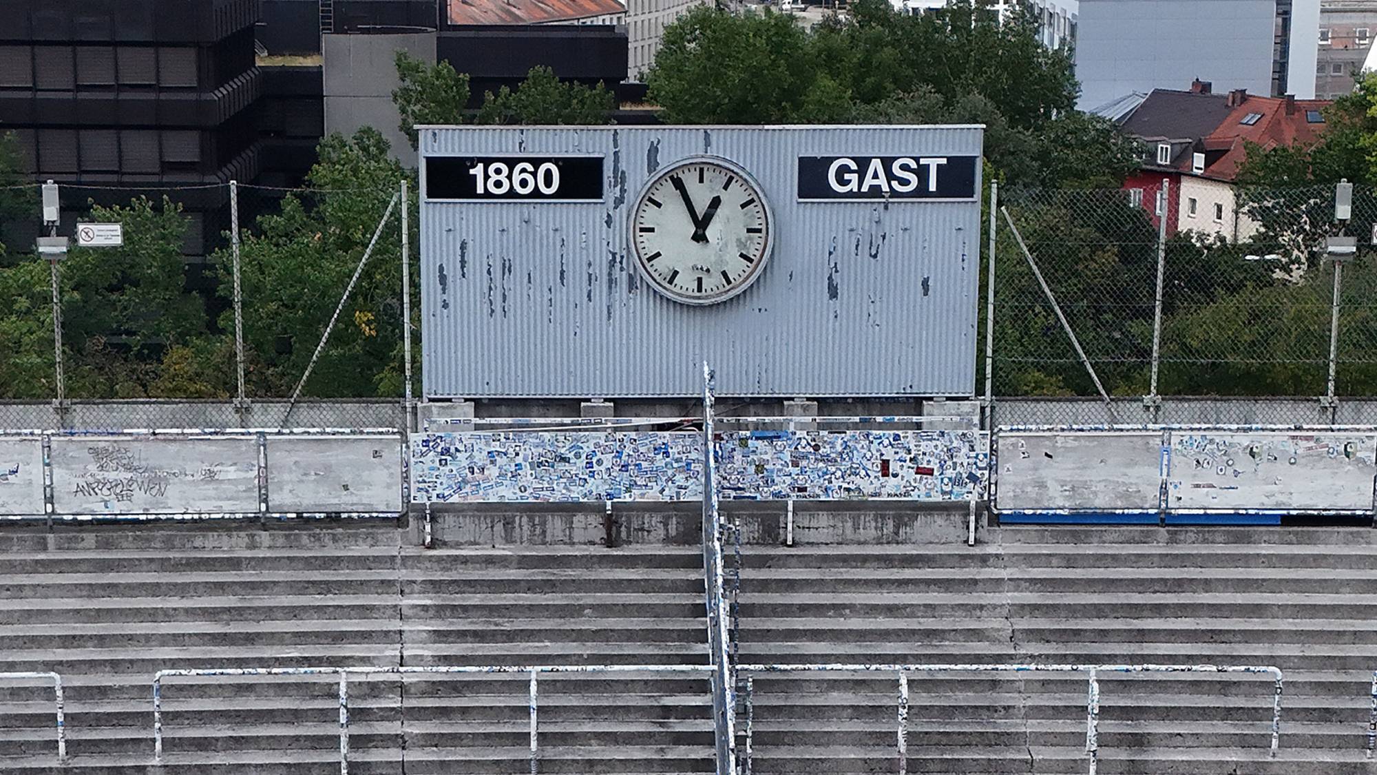 Aerial view of Gruenwalder Stadium, empty North stands, the Sechzger fans [supporters], football fans, stands with scoreboard and clock. The facility is located in the Giesing district in the capital city Munich and is the home ground of the football club