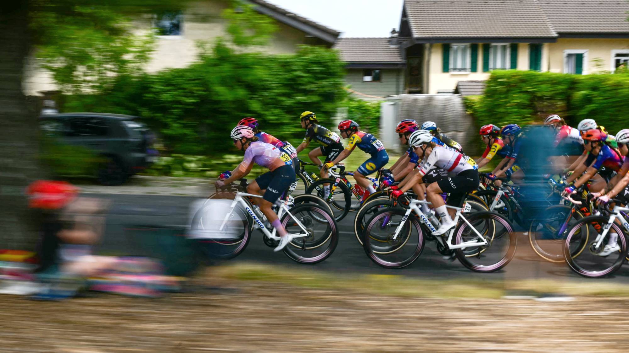 The pack rides during the 3rd (out of 9) stage of the fifth edition of the Women's Tour de France cycling race, 156.5 km from Geneva to Poligny, in Poligny, central-eastern France on August 3, 2026.