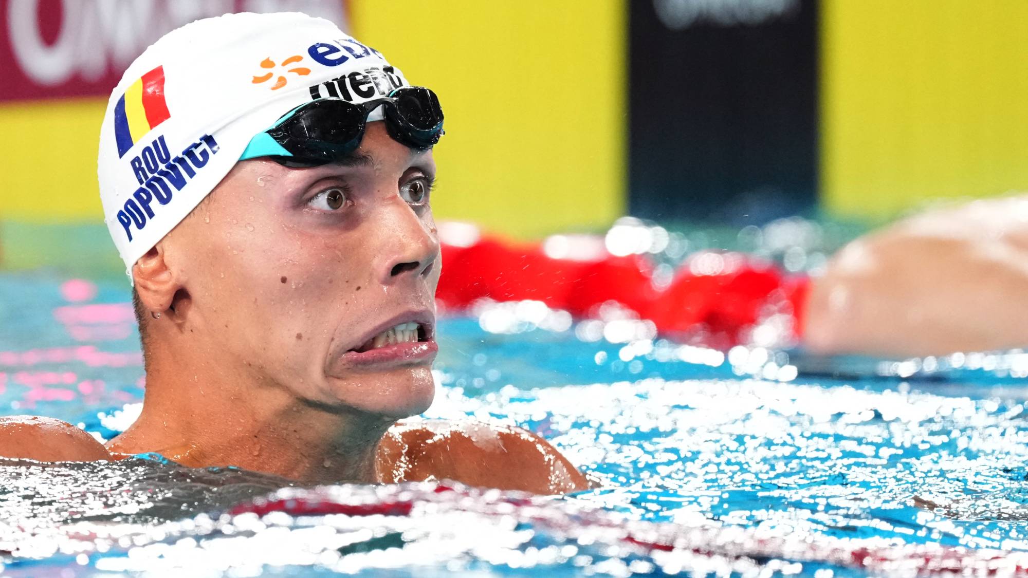 Romania's David Popovici reacts after winning the final of the men's 200m freestyle swimming event during the LEN European Aquatics Championships at the Olympic Aquatic Centre in Saint-Denis, northern suburbs of Paris, on August 14, 2026.