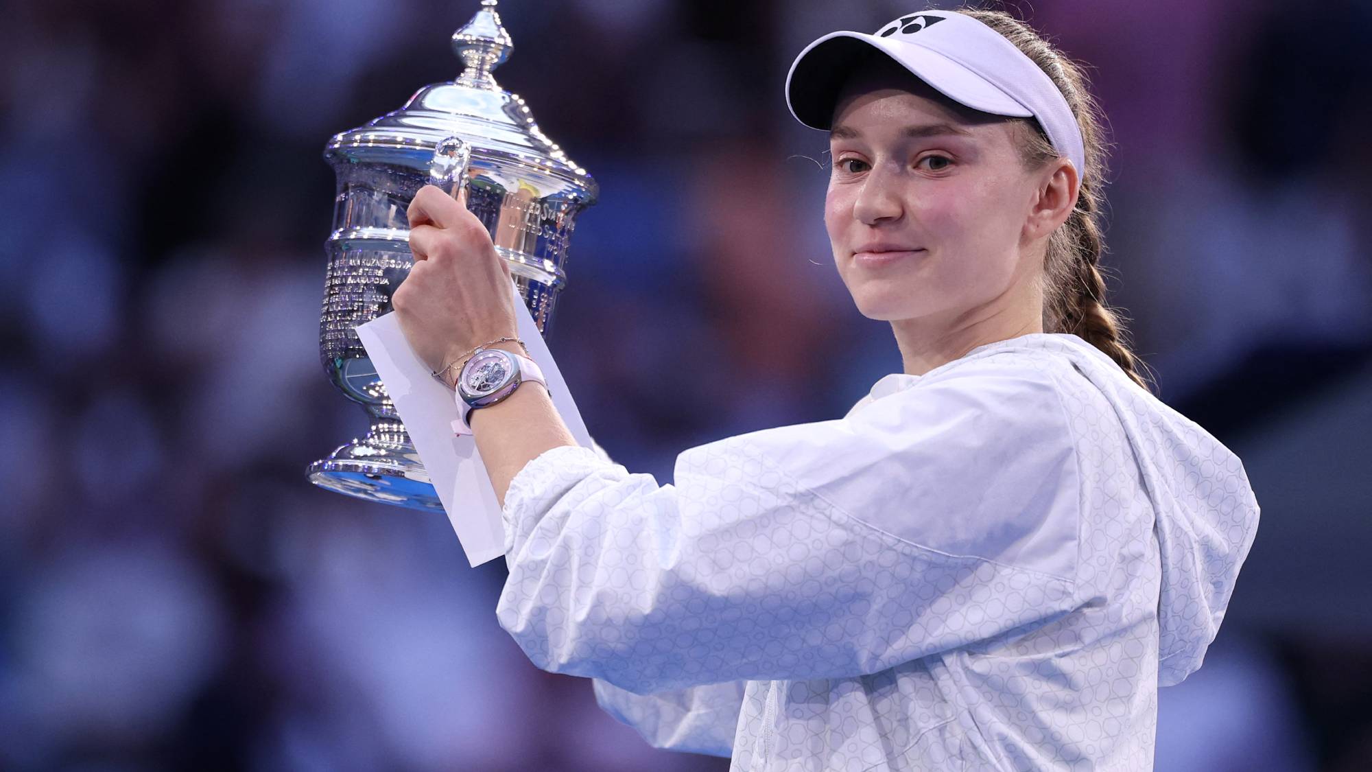 NEW YORK, NEW YORK - SEPTEMBER 12: Elena Rybakina of Kazakhstan celebrates with the trophy after defeating Aryna Sabalenka in their Women's Singles Final match on Day Fourteen of the 2026 US Open at USTA Billie Jean King National Tennis Center on September 12, 2026 in the Flushing neighborhood of the Queens borough of New York City. Julian Finney/Getty Images/AFP