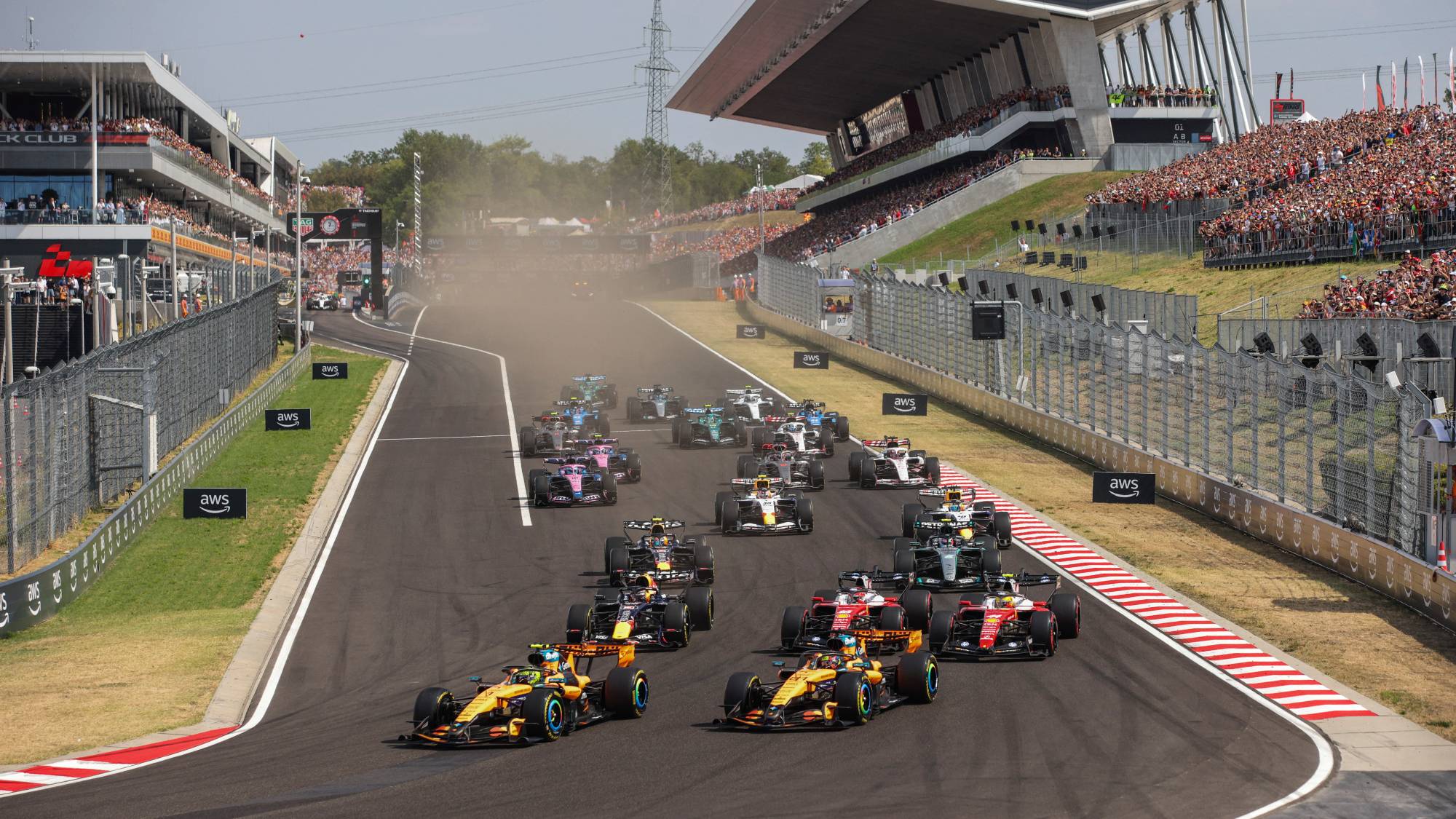 Formula 1 drivers Lando Norris of McLaren F1 Team, Oscar Piastri of McLaren F1 Team, Charles Leclerc of Scuderia Ferrari, Lewis Hamilton of Scuderia Ferrari, and Max Verstappen of Red Bull Racing are pictured at the start of the race during the Formula 1 AWS Hungarian Grand Prix at the Hungaroring Circuit in Budapest, Hungary. (Photo by Gongora/NurPhoto)