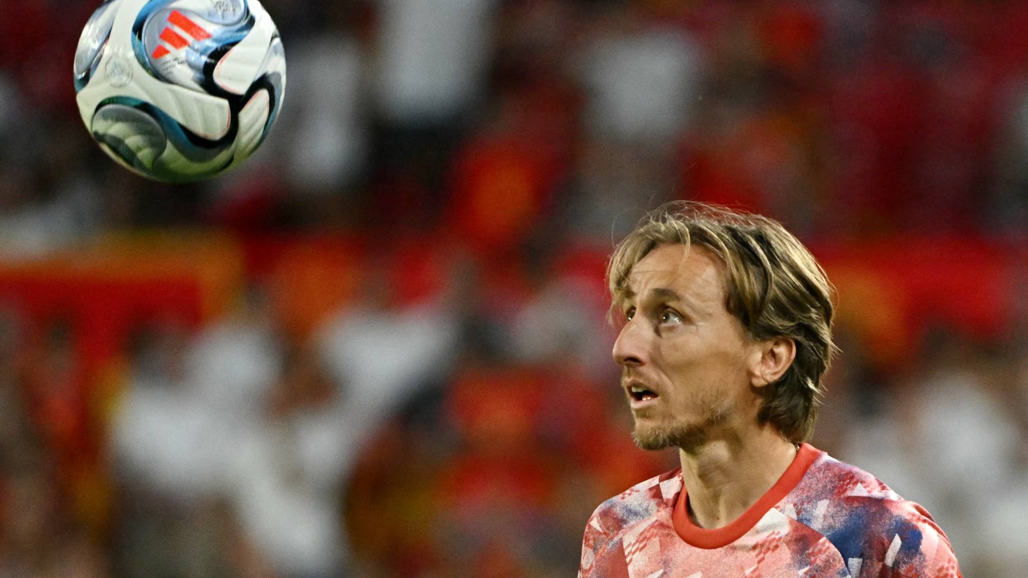 Croatia's midfielder #10 Luka Modric eyes the ball during warm-up before the start of the UEFA Nations League league phase group A3 football match between Spain and Croatia at Ramon Sanchez Pizjuan Stadium in Seville on September 29, 2026.