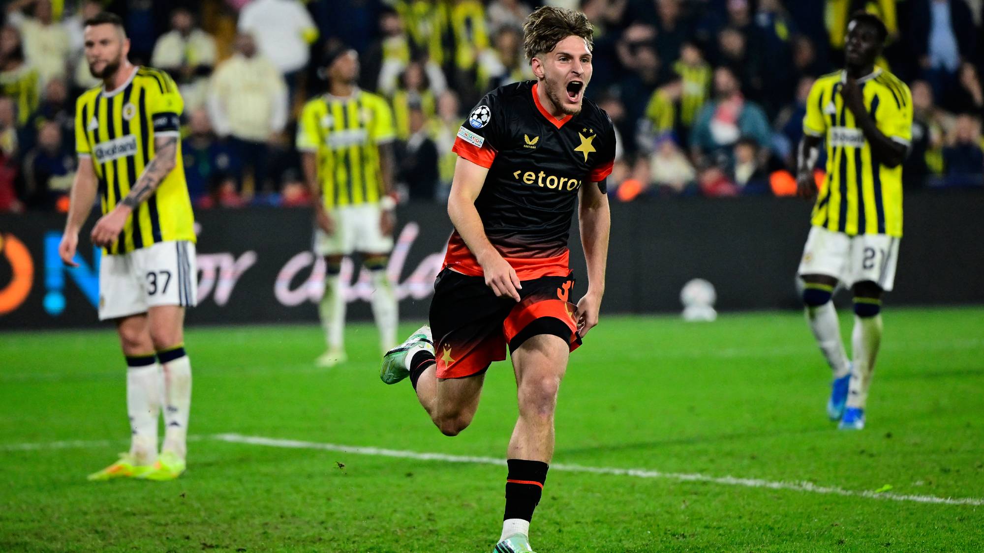 Slavia Prague's Czech forward #32 Pavel Kacor celebrates after scoring his team second goal during the UEFA Champions League first round day 3 football match between Fenerbahce and Slavia Prague at the Fenerbahce Sukru Saracoglu Spor Kompleksi stadium in Istanbul on October 20, 2026.