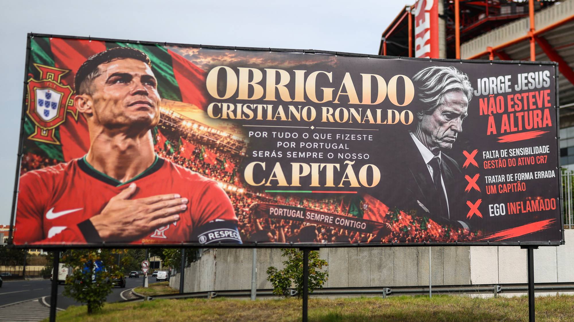 A billboard in support of Portugal’s forward Cristiano Ronaldo reading “Thank you Cristiano Ronaldo for all that you did for Portugal. You will be always our captain” mixed with an adjacent message critical against Portugal’s coach Jorge Jesus reading “Jorge Jesus was not up to the job" and “lack of sensitivity in managing the CR7 asset”, the fact that he “mishandled a captain” is pictured near Luz stadium in Lisbon on October 2, 2026.